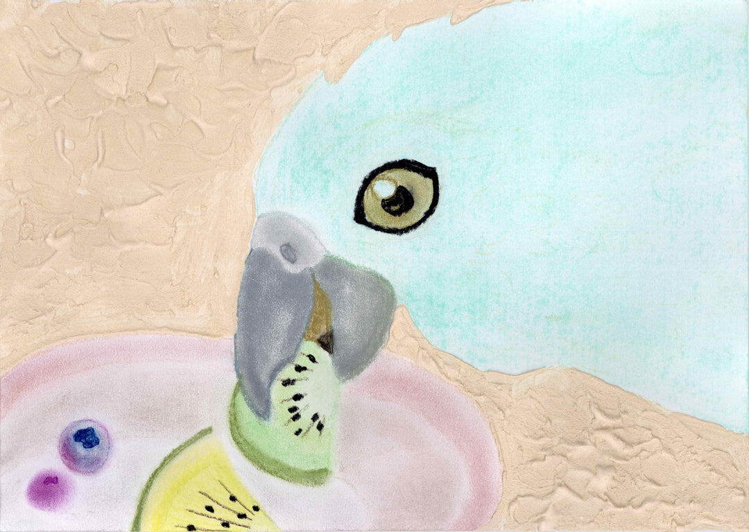 食べているインコ